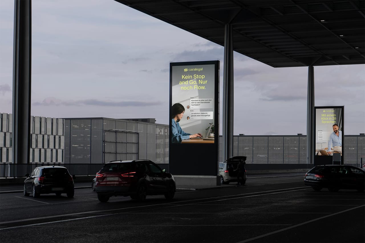 Advert on a car park building with text about workflow