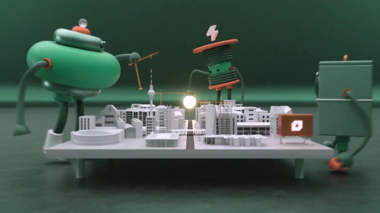 3D mascots of the HPT brand, a green kettle robot and a coil with a lightning bolt, on a model of Berlin