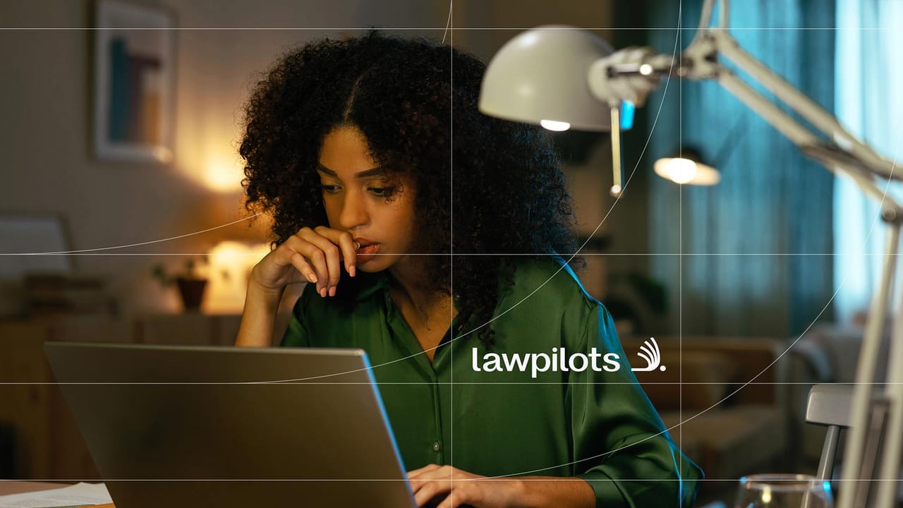 lawpilots key visual: a woman works thoughtfully on her laptop in the evening, overlaid with the airline grid and the lawpilots logo
